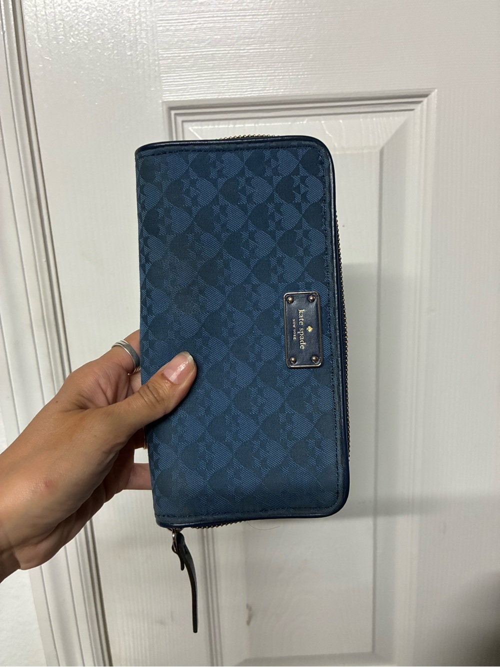kate spade navy patterned zip-around wallet